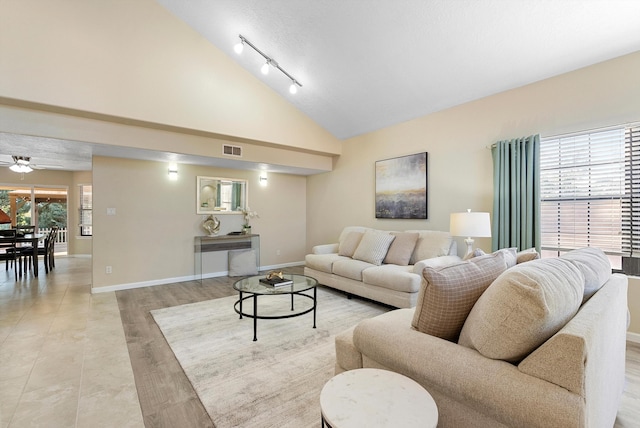 4432 La Paloma Rd NW, Albuquerque, NM 87120 - living room with lofted ceiling and a ceiling fan
