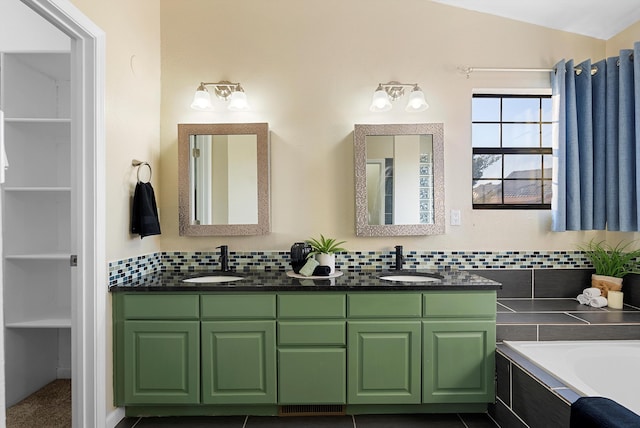 4432 La Paloma Rd NW, Albuquerque, NM 87120 - full bathroom featuring double vanity, a garden tub, vaulted ceiling, and tasteful backsplash