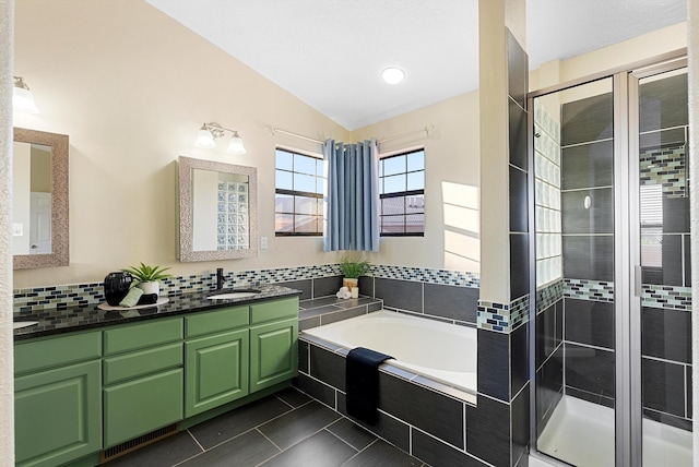 4432 La Paloma Rd NW, Albuquerque, NM 87120 - full bathroom featuring a bath, a shower stall, and double vanity