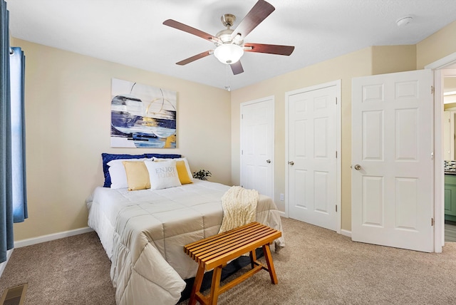 4432 La Paloma Rd NW, Albuquerque, NM 87120 - bedroom featuring light colored carpet and ceiling fan