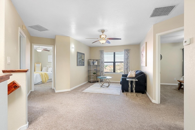 4432 La Paloma Rd NW, Albuquerque, NM 87120 - sitting room with ceiling fan and carpet floors