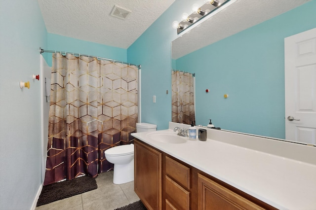 1191 Carrizo St NW, Los Lunas, NM 87031 - full bath featuring tile patterned floors, vanity, and a shower with curtain