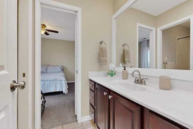 3546 Newcastle Dr SE, Rio Rancho, NM 87124 - bathroom featuring vanity, ceiling fan, and connected bathroom