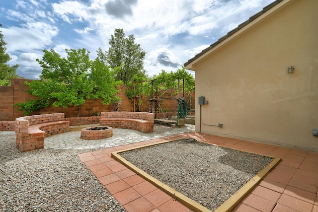 1852 Smarty Jones St SE, Albuquerque, NM 87123 - view of patio with a fire pit