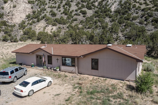 34358 US Highway 285, Ojo Caliente, NM 87549 - view of front facade featuring roof with shingles