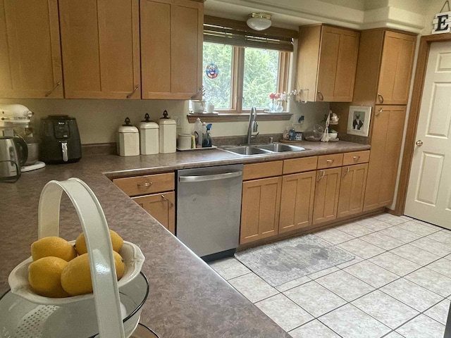 34358 US Highway 285, Ojo Caliente, NM 87549 - kitchen featuring dishwasher, dark countertops, light tile patterned floors, and brown cabinets