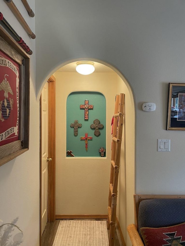 34358 US Highway 285, Ojo Caliente, NM 87549 - corridor featuring arched walkways and wood finished floors