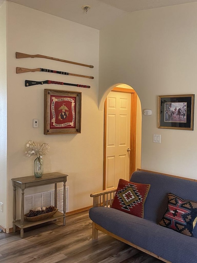 34358 US Highway 285, Ojo Caliente, NM 87549 - sitting room with wood finished floors and arched walkways