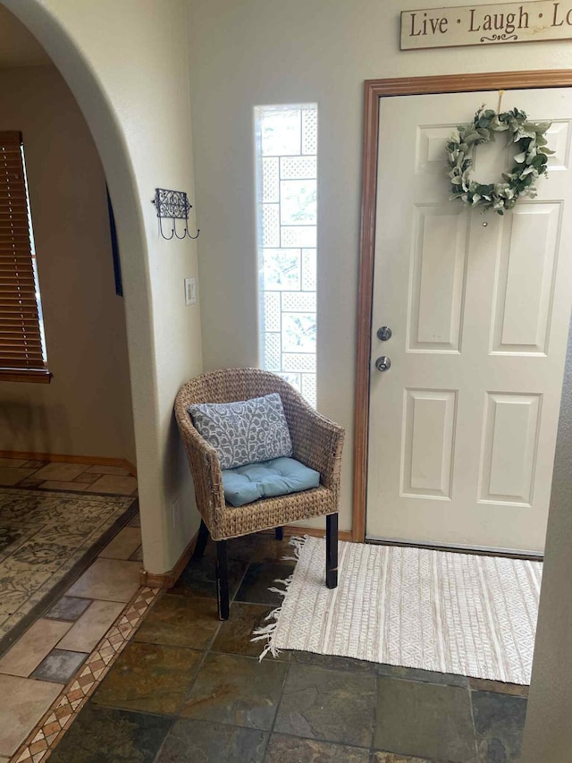 34358 US Highway 285, Ojo Caliente, NM 87549 - entryway with arched walkways and stone tile flooring
