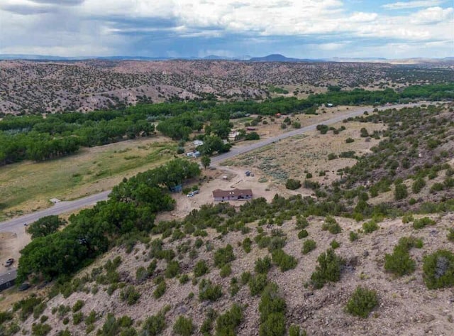 34358 US Highway 285, Ojo Caliente, NM 87549 - view of mountain backdrop featuring a desert landscape and rural landscape