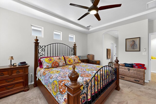 4276 Crowned Eagle Loop NE, Rio Rancho, NM 87144 - bedroom with light carpet, arched walkways, and ceiling fan