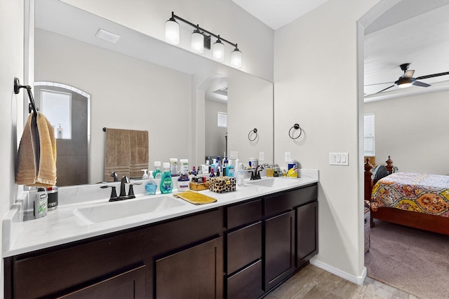 4276 Crowned Eagle Loop NE, Rio Rancho, NM 87144 - ensuite bathroom with double vanity and ceiling fan