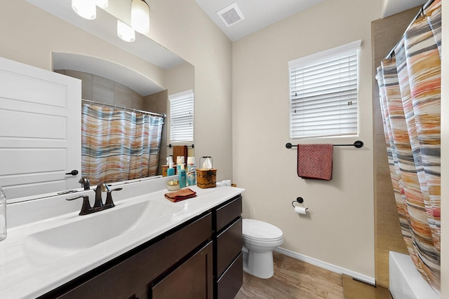 4276 Crowned Eagle Loop NE, Rio Rancho, NM 87144 - full bath with vanity, wood finished floors, and shower / tub combo