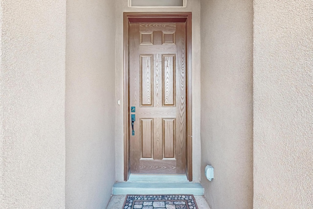4276 Crowned Eagle Loop NE, Rio Rancho, NM 87144 - view of exterior entry featuring stucco siding