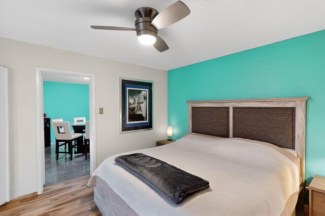 1308 Boatright Dr NE, Albuquerque, NM 87112 - bedroom with wood finished floors and ceiling fan