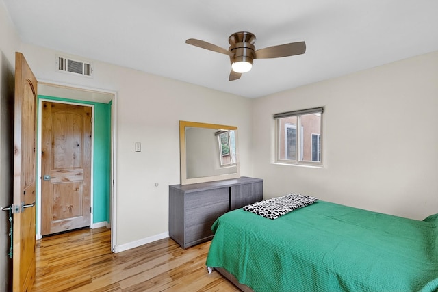 1308 Boatright Dr NE, Albuquerque, NM 87112 - bedroom with light wood-style floors and a ceiling fan