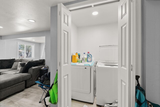 2024 Hinkle St SE, Albuquerque, NM 87102 - washroom featuring separate washer and dryer, recessed lighting, and light wood finished floors