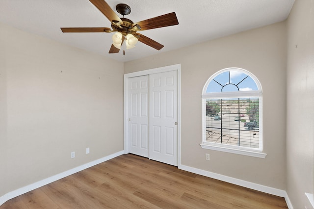 5508 Carefree Ave NW, Albuquerque, NM 87120 - unfurnished bedroom featuring light wood-style floors, a closet, and ceiling fan