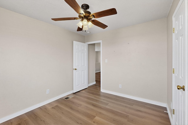 5508 Carefree Ave NW, Albuquerque, NM 87120 - unfurnished bedroom featuring light wood-style floors and a ceiling fan