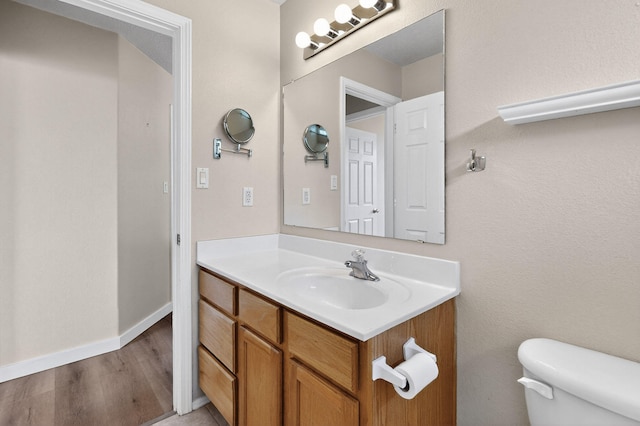 5508 Carefree Ave NW, Albuquerque, NM 87120 - bathroom with vanity and wood finished floors