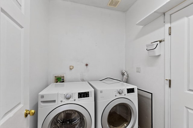 5508 Carefree Ave NW, Albuquerque, NM 87120 - laundry area with washing machine and clothes dryer