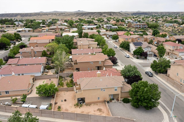 5508 Carefree Ave NW, Albuquerque, NM 87120 - aerial perspective of suburban area with a mountainous background