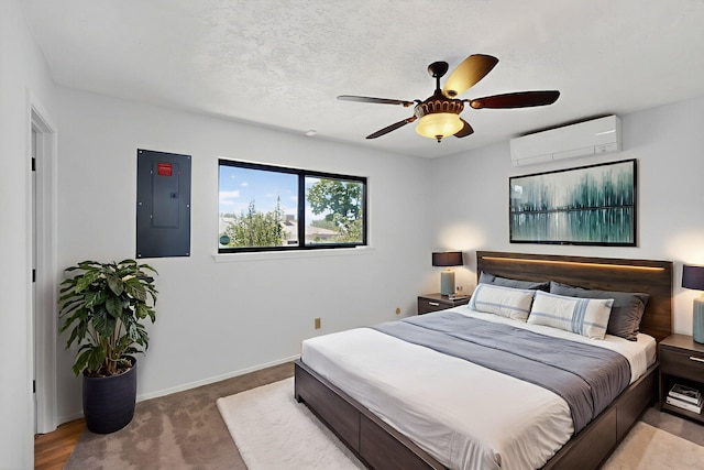 12208 Phoenix Ave NE, Albuquerque, NM 87112 - bedroom with a wall mounted AC, electric panel, ceiling fan, and carpet