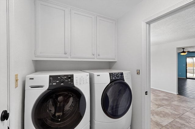 12208 Phoenix Ave NE, Albuquerque, NM 87112 - laundry room with washer and clothes dryer, cabinet space, a ceiling fan, and light tile patterned floors