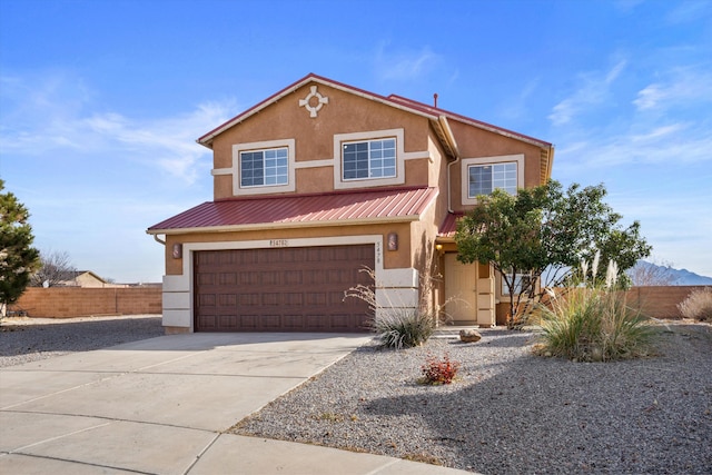 5478 Salem Ct NE, Rio Rancho, NM 87144 - view of front of property featuring stucco siding, an attached garage, concrete driveway, and a metal roof