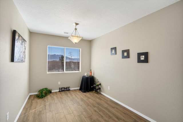 5478 Salem Ct NE, Rio Rancho, NM 87144 - empty room featuring wood finished floors and baseboards
