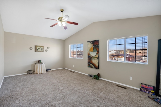 5478 Salem Ct NE, Rio Rancho, NM 87144 - empty room featuring a ceiling fan, carpet floors, and vaulted ceiling
