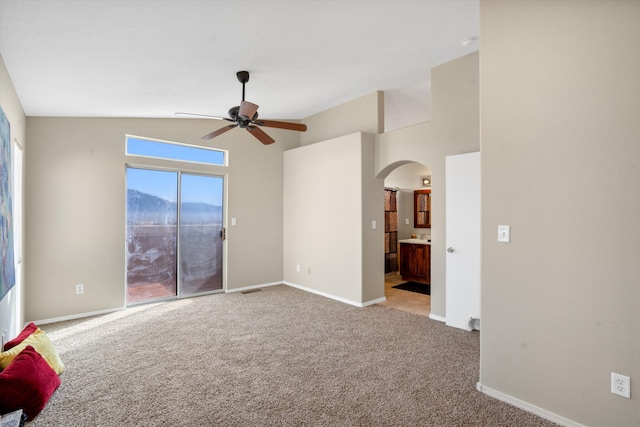 5478 Salem Ct NE, Rio Rancho, NM 87144 - empty room featuring arched walkways, a ceiling fan, carpet floors, and lofted ceiling