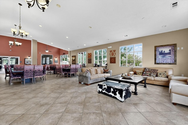 11008 Marina Gate Trl NE, Albuquerque, NM 87123 - living area with a chandelier, recessed lighting, light tile patterned flooring, and high vaulted ceiling