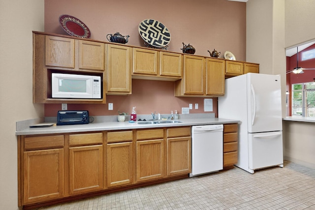 11008 Marina Gate Trl NE, Albuquerque, NM 87123 - kitchen featuring white appliances, light countertops, and a high ceiling