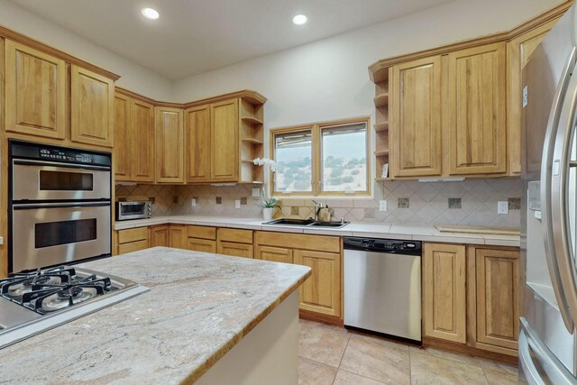 39 Pine Rd, Placitas, NM 87043 - kitchen with appliances with stainless steel finishes, open shelves, recessed lighting, decorative backsplash, and light tile patterned floors