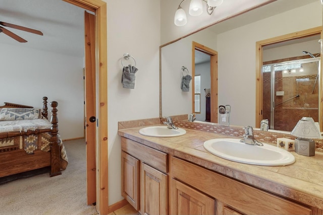 39 Pine Rd, Placitas, NM 87043 - ensuite bathroom with ceiling fan, double vanity, and a stall shower