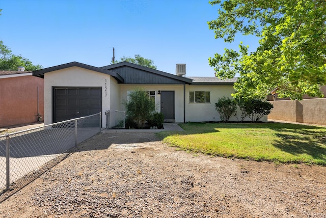 11517 San Jacinto Ave NE, Albuquerque, NM 87112 - single story home with driveway, a garage, and stucco siding