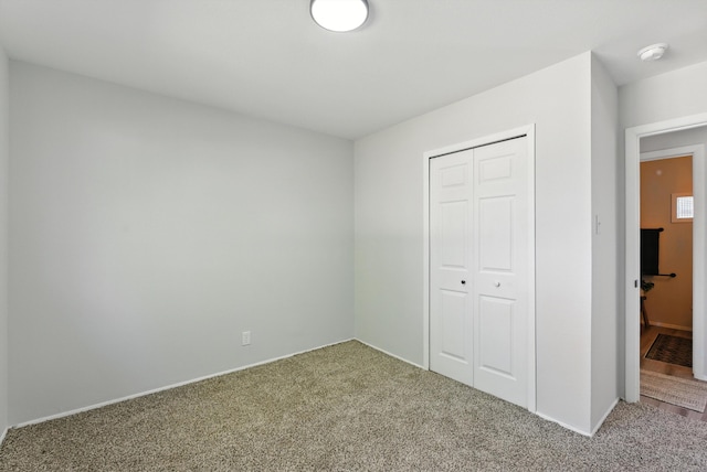 11517 San Jacinto Ave NE, Albuquerque, NM 87112 - unfurnished bedroom featuring carpet floors and a closet