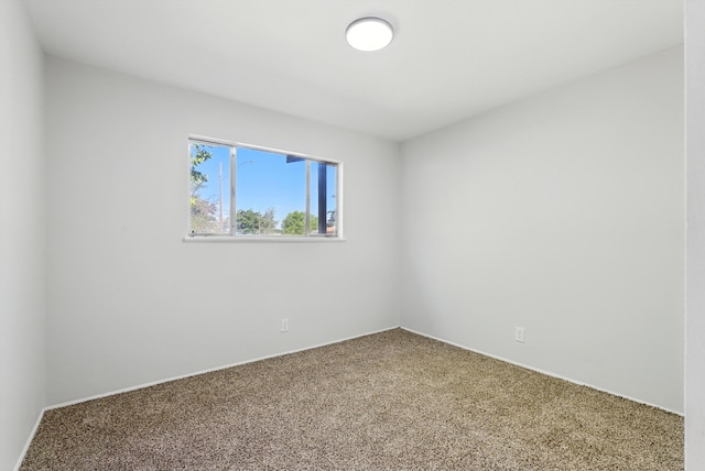 11517 San Jacinto Ave NE, Albuquerque, NM 87112 - carpeted spare room with baseboards