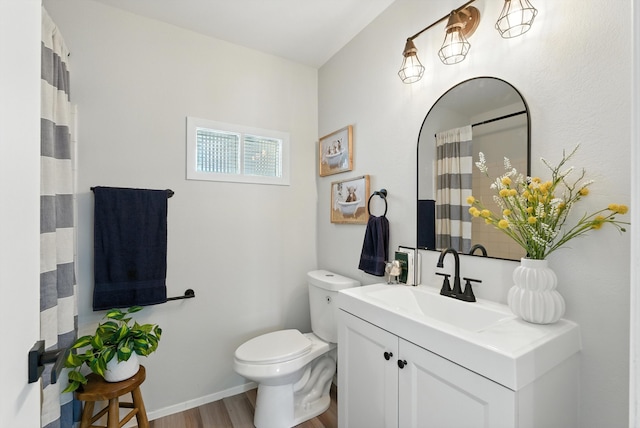 11517 San Jacinto Ave NE, Albuquerque, NM 87112 - full bath with wood finished floors and vanity