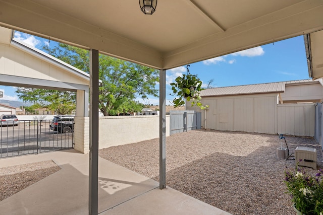 121 Pearl Dr NE, Rio Rancho, NM 87124 - fenced backyard with a patio