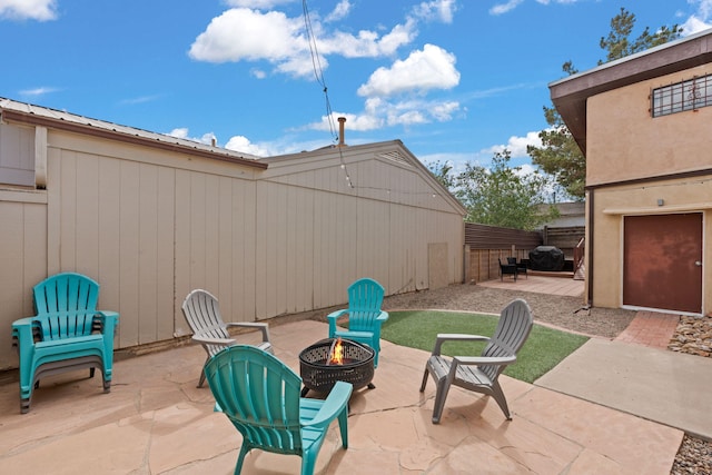 121 Pearl Dr NE, Rio Rancho, NM 87124 - view of patio / terrace featuring a fire pit