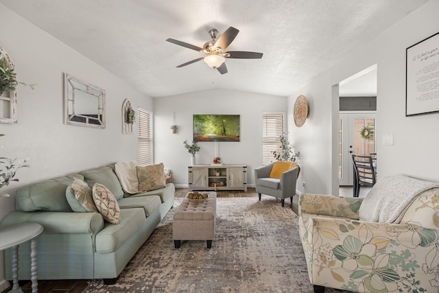 121 Pearl Dr NE, Rio Rancho, NM 87124 - living area with wood finished floors, healthy amount of natural light, lofted ceiling, a ceiling fan, and a textured ceiling
