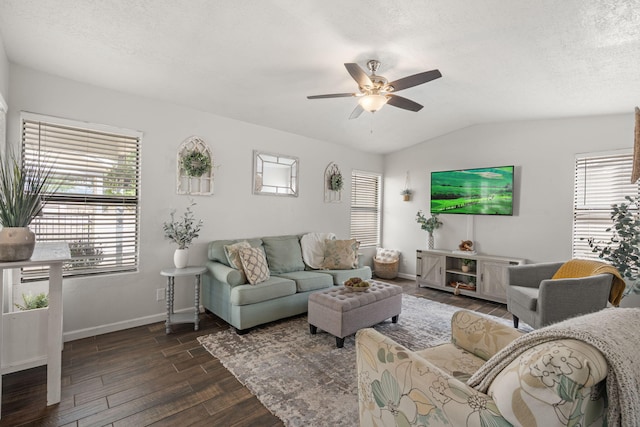 121 Pearl Dr NE, Rio Rancho, NM 87124 - living area featuring dark wood-type flooring, a ceiling fan, vaulted ceiling, and a textured ceiling