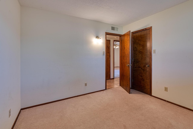 9201 Academy Hills Dr NE, Albuquerque, NM 87111 - unfurnished room featuring light colored carpet and baseboards
