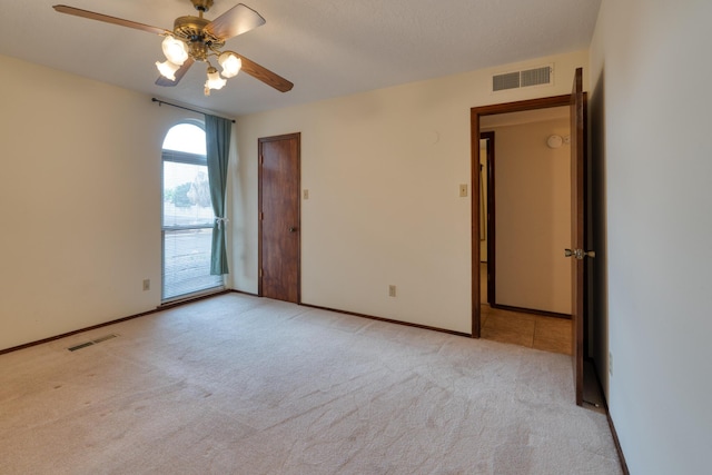 9201 Academy Hills Dr NE, Albuquerque, NM 87111 - unfurnished room featuring light colored carpet and ceiling fan