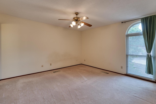 9201 Academy Hills Dr NE, Albuquerque, NM 87111 - empty room with light colored carpet and a ceiling fan