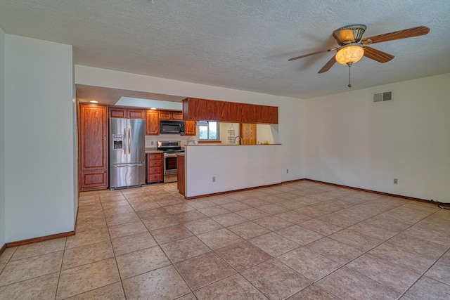 9201 Academy Hills Dr NE, Albuquerque, NM 87111 - unfurnished living room featuring a textured ceiling, light tile patterned floors, and ceiling fan
