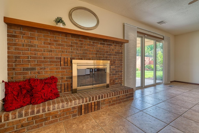 9201 Academy Hills Dr NE, Albuquerque, NM 87111 - unfurnished living room featuring a brick fireplace and a textured ceiling