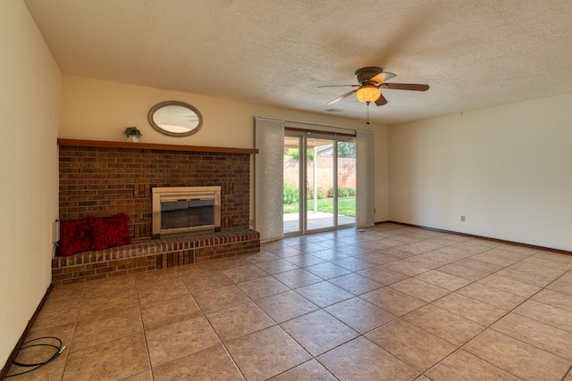 9201 Academy Hills Dr NE, Albuquerque, NM 87111 - unfurnished living room featuring a ceiling fan, a textured ceiling, a brick fireplace, and tile patterned floors